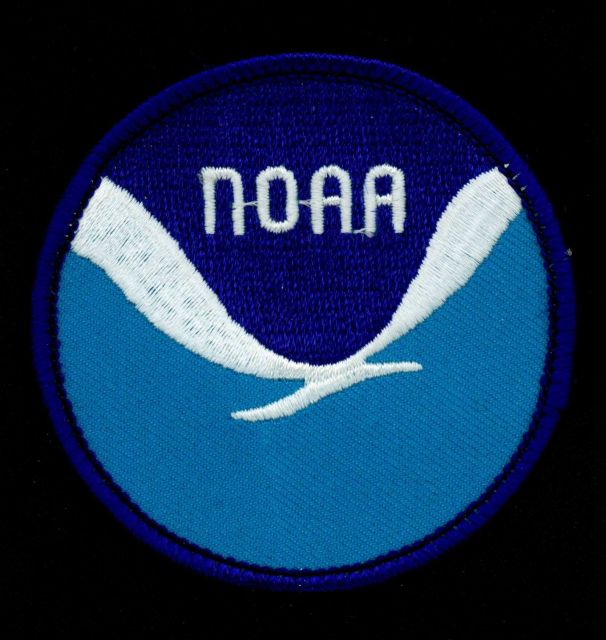 Patch showing the official emblem of the National Oceanic and Atmospheric Administration. Picture