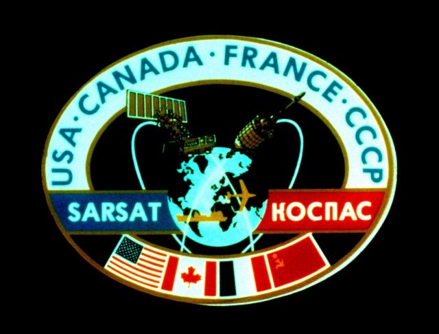 NOAA SARSAT patch signifying international cooperation between France, Canada, the United States, and the former Soviet Union. Picture