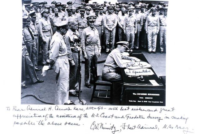 Copy of Admiral Chester Nimitz signing Japanese surrender document at the end of World War II Picture