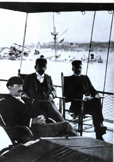 Unidentified officers sitting on the stern of the Coast and Geodetic Survey Ship BACHE in Havana Harbor on February 16, 1898 Picture