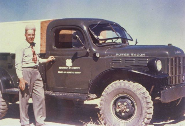 Party chief, Lieutenant Commander Marvin Paulson, somewhere in the western states, with his Dodge Power Wagon. Picture