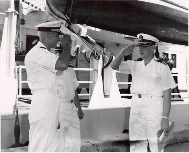 Captain Wardwell saluting Commander Whipp. Picture