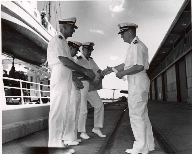 Captain Wardwell presenting CME Moroni Metcalf with certificate Picture