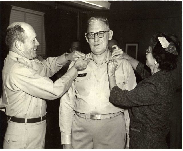 Captain David Whipp having his captain's eagles pinned on by Major General Harry H Picture