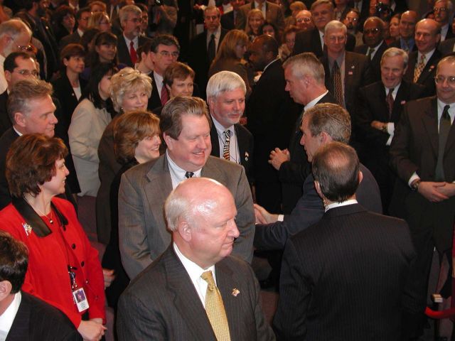 Deputy Assistant Administrator of Fisheries John Oliver shaking hands with President George W Picture