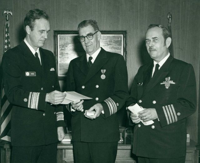 Rear Admiral Harley Nygren, first director of NOAA Corps, with Rear Admiral Allen Powell, head of the National Ocean Survey, and Captain Miller J Picture