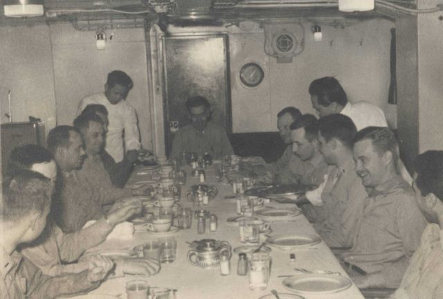 Wardroom of USC&GS Ship PATHFINDER with Executive Officer Joseph Partington at head of table. Picture