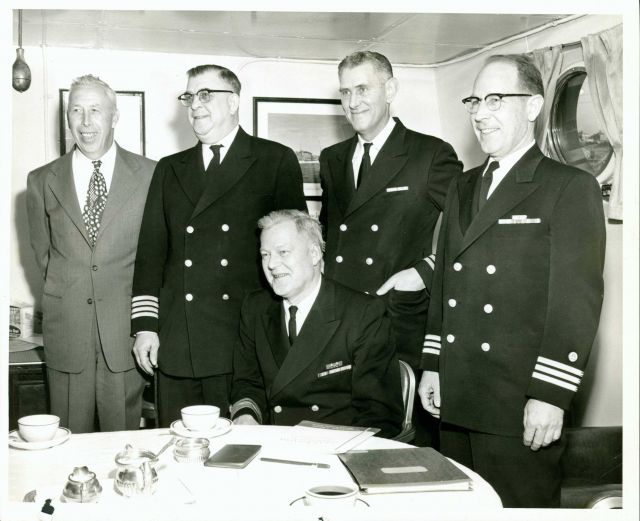 CAPT Frank Johnson, CAPT Carl Mast, RADM (LH) Charles Pierce (sitting), CAPT Ira Rubottom, and CDR Gerald Short. Picture