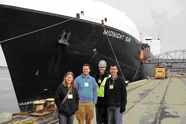Alaska National Weather Service employees Louise Fode, Todd Foisy, Larry Hubble, and Tom Dang visit the containership M/V Midnight Sun Picture