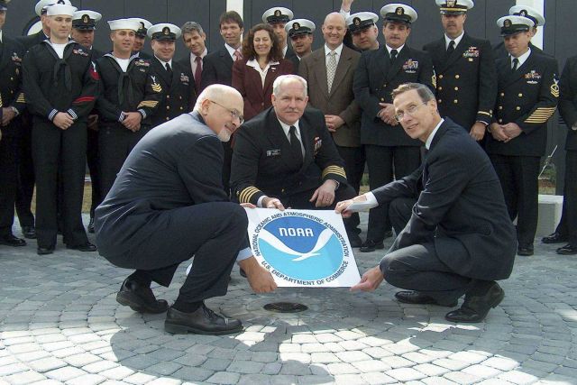 NOAA Administrator VADM Conrad Lautenbacher (R), NOAA Director of National Marine Sanctuary Program Dan Basta (L), and Navy Captain Christopher Murray Picture