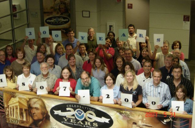 After an All-Hands meeting at NOAA Fisheries' Southeast Regional Office, employees gathered to commemorate NOAA's 200 years of science, service, and s Picture
