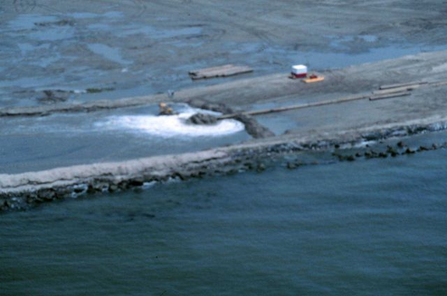 An overview of sediment being pumped into the containment area. Picture