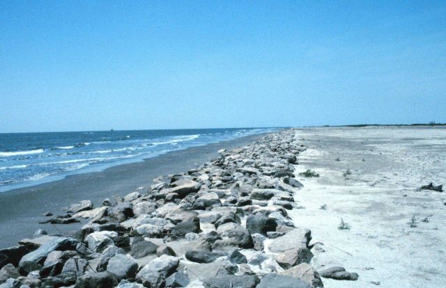 The rock revetment shoreline of the restored area of East Timbalier Island. Picture