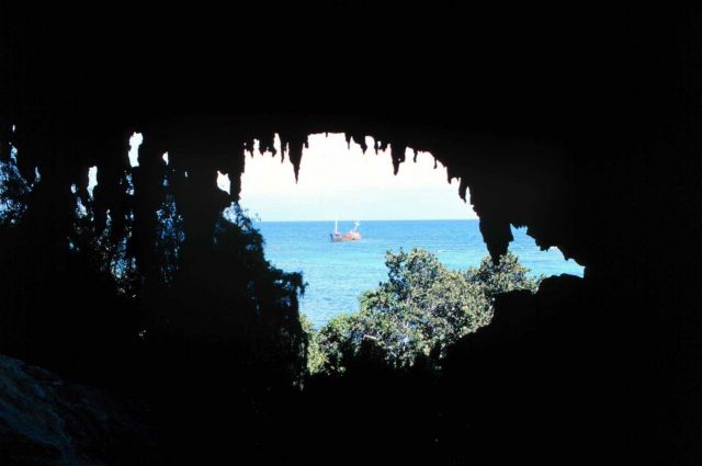 Looking out at the M/V El Alborada from inside the cliffs at Mona Island at the east end of the island. Picture