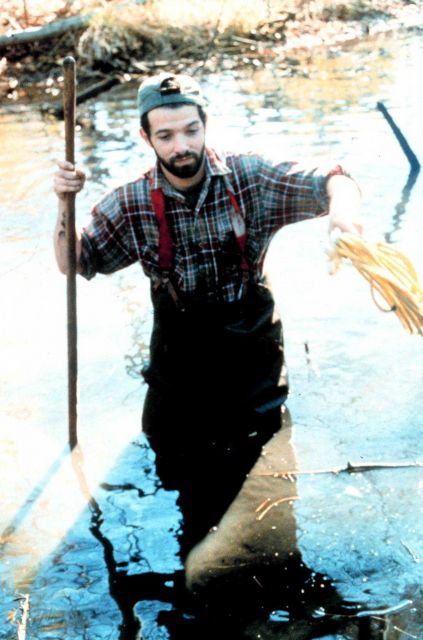 Andy Lipsky of Save the Bay, RI staff assists with the clean-up of Mussachuck Creek. Picture