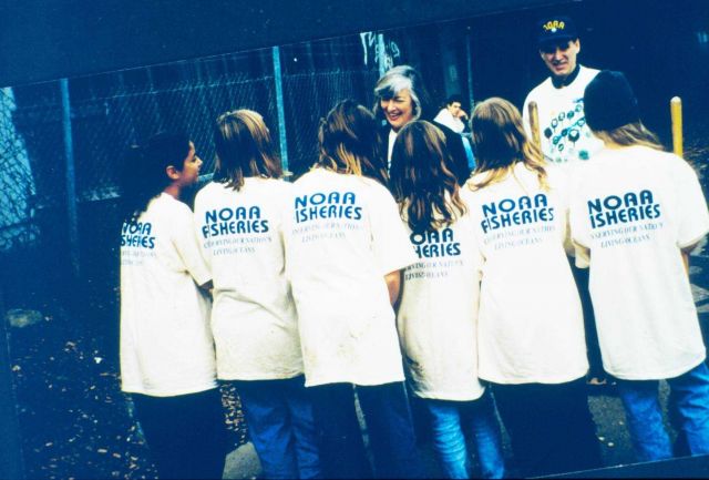 A group of volunteers pose with Representative Lynn Woolsey, a big supporter of NOAA's community restoration efforts. Picture