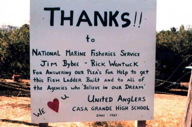 A sign constructed by the students thanks NOAA for its role in the construction of the fish pools. Picture