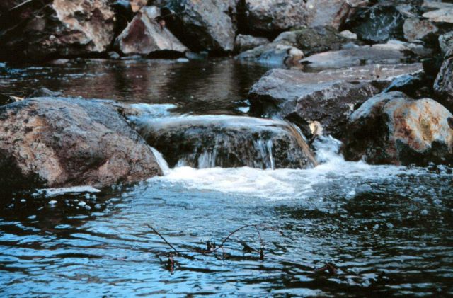 Looking downstream as the water flows over the completed pools. Picture