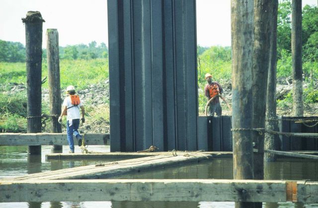 Workers installing sheet metal Picture