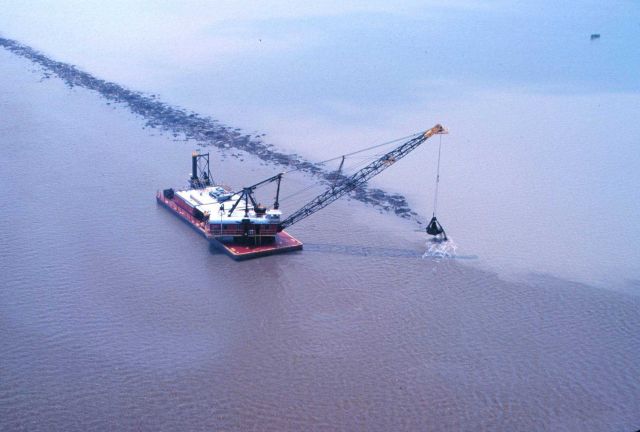 A bucket dredge at work. Picture
