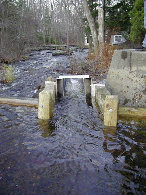 Immediately after installation of the fishway, water rushes through the Alaskan Steep Pass Picture