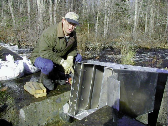 Eric Hutchins of NOAA checks the fit of the ladder at the restoration site. Picture