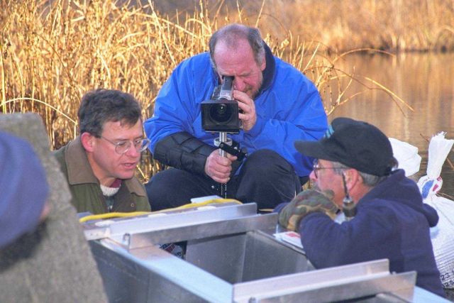 A NOAA contract videographer, Tom Kane, documents installation of the first Alaskan Steep Pass fish ladder in New England waters. Picture