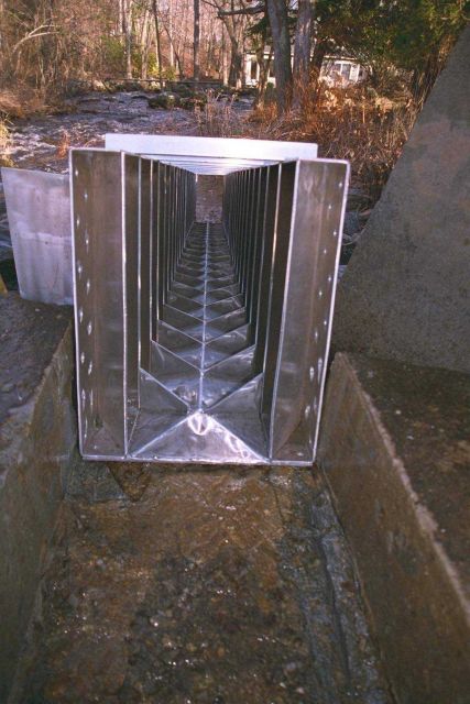 A close up view looking down into the Alaskan Steep Pass fish ladder that was installed the Parker River dam to assist fish in navigating the dam. Picture