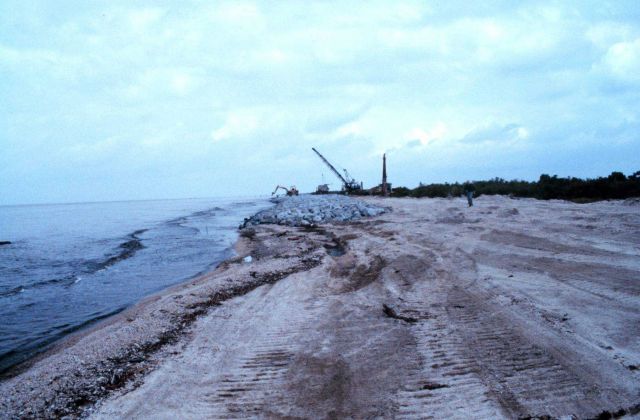 A view of the southeast end of the project area, equipment used in the construction is in the background. Picture