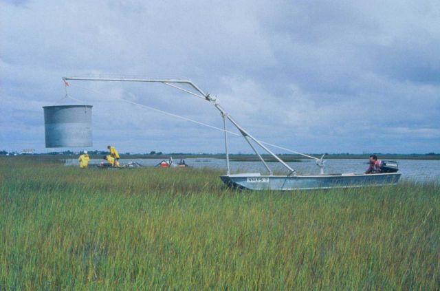 A drop sampler mounted on the bottom of a shallow draft boat Picture