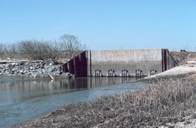 The tide gate at the mouth of Army Creek on the Delaware side of the river Picture