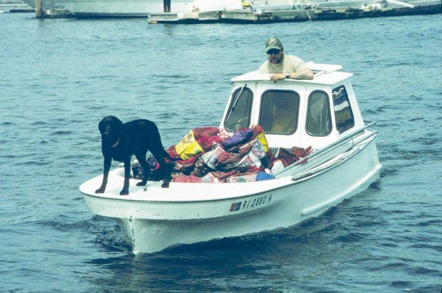Another boat heads in with a full harvest of quahogs. Picture