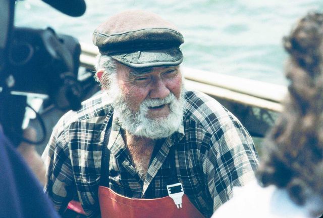 A local shellfisherman unloads his harvest at the docks where the quahogs were weighed by local shellfish enforcement agencies before being transferre Picture