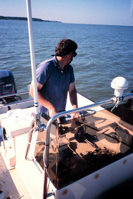 Lee Crockett, formerly of NOAA, pilots the boat used in the sampling process. Picture