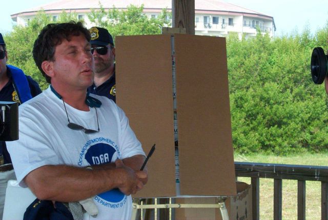 Scott Gudes delivers a welcome speech to the volunteers that joined the NOAA Restoration Center staff and Tampa Baywatch to assist in the monofilament Picture