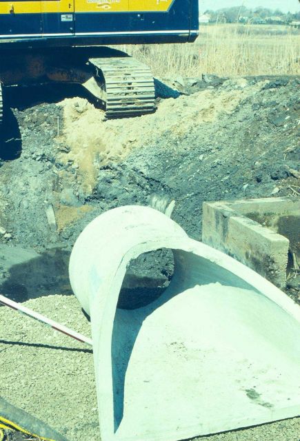 The fourth image in this series shows the size of the culvert after it was placed where the main creek intersects the road Picture