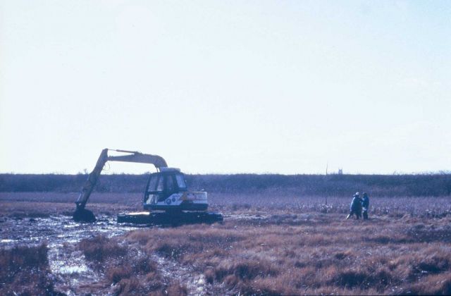 A distant view of the specialized ditch digger at work. Picture