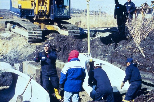 A series of images show the placement of the new culvert at Sachuest Marsh. Picture