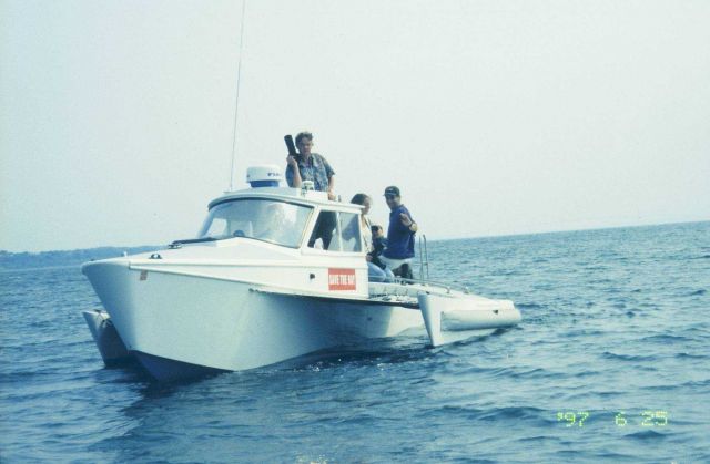 The Save the Bay boat carries reporters to the transplant site. Picture