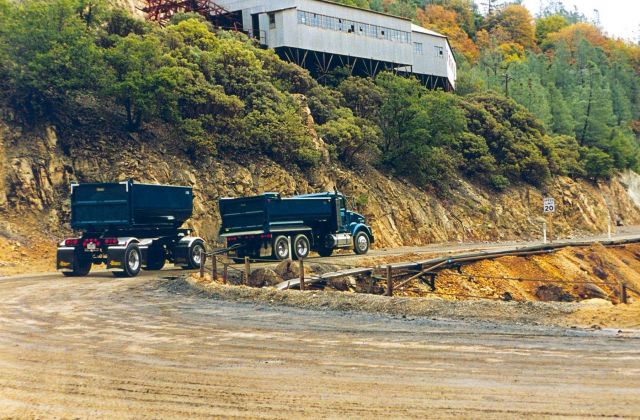 Trucks (perhaps sludge carriers) on Iron Mountain Mine. Picture