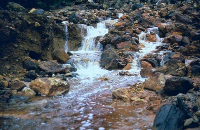 Surface runoff through the mine dump at Iron Mountain Mine. Picture