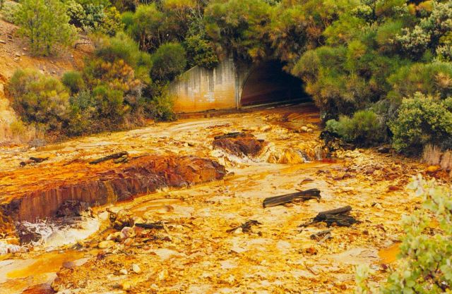The stream below the Debris Dam, Iron Mountain Mine. Picture