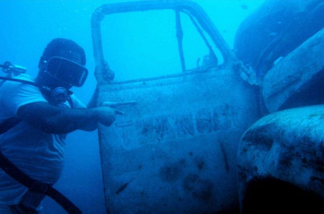 Truk native diving on artificial reef Picture