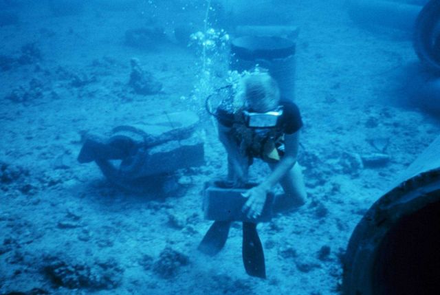 Diver laying transect line for conducting fish survey. Picture