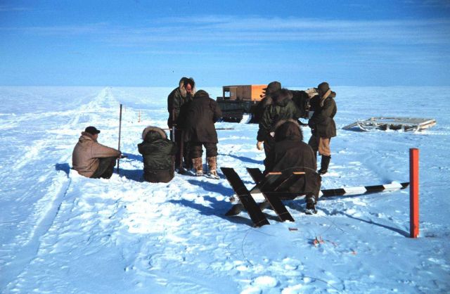 Baseline measurements on the lagoon ice - note stakes along line Picture