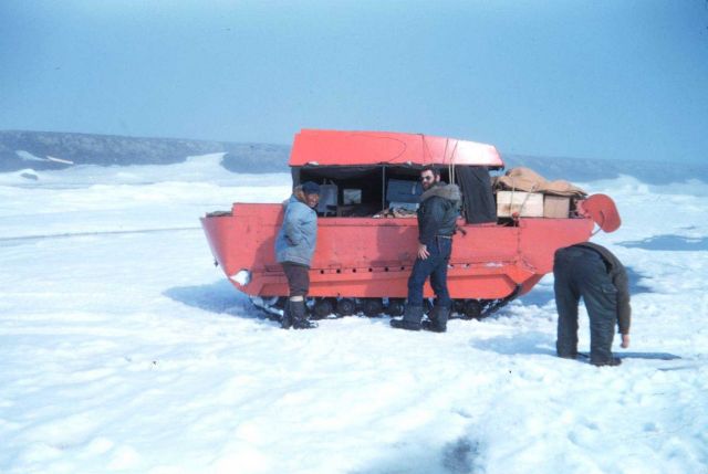 Indications of the coming spring melt - bare hills, pools of water, bare hands Picture