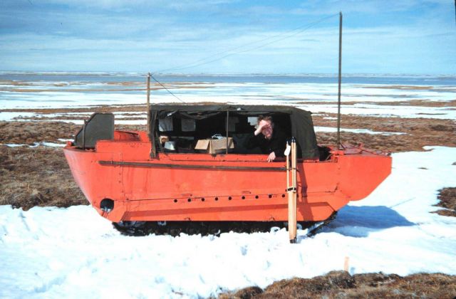 Lieutenant Francis Popper driving a weasel during magnetic observation operations. Picture