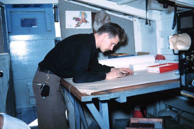 Harley Nygren working on a hydrographic survey sheet on Survey Launch -15 Picture