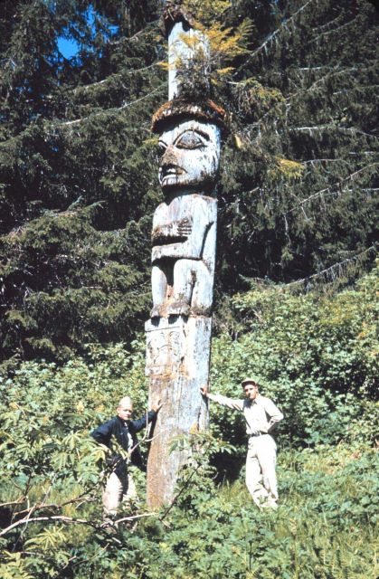 Harley Nygren on the right next to a magnificent totem pole at Old Kasaan Survey crew off the PATHFINDER Picture