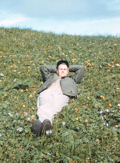 Lieutenant Harley Nygren luxuriating in the greenery and wildflowers on the slopes of Mount Ballyhoo Picture